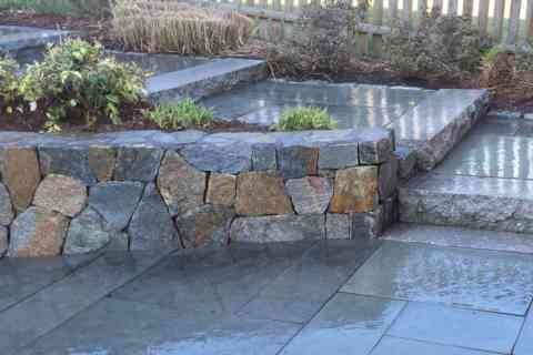 Retaining stone wall construction