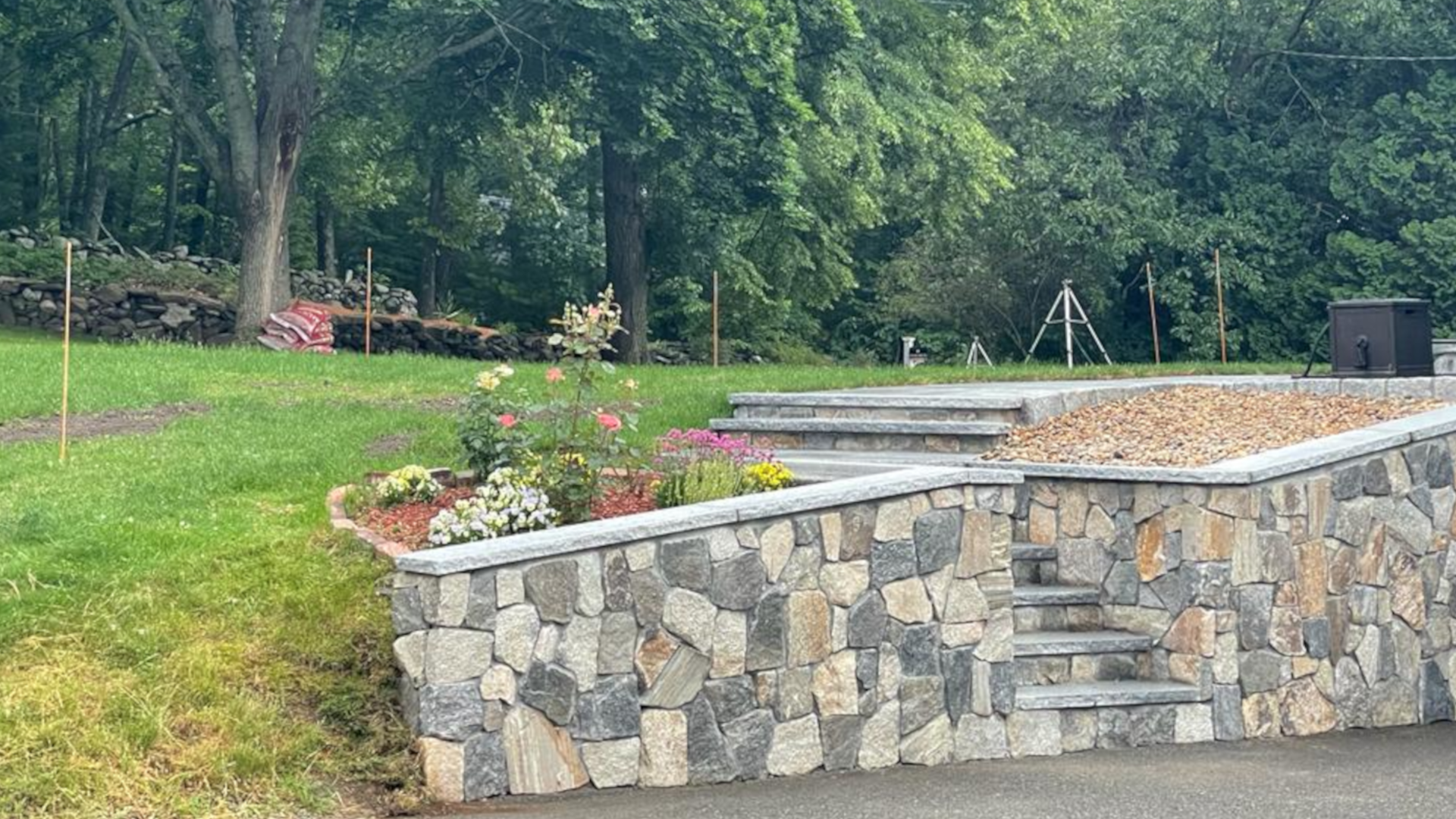 Landscape stone wall by Eddy's